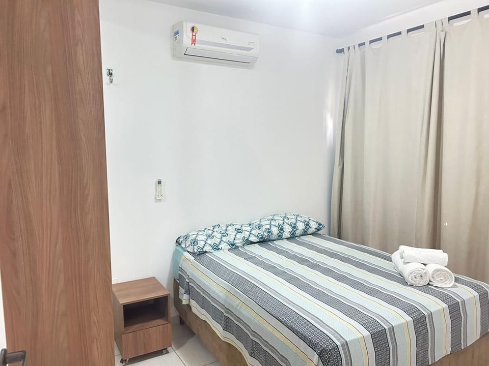 Bed, wardrobe, air conditioner