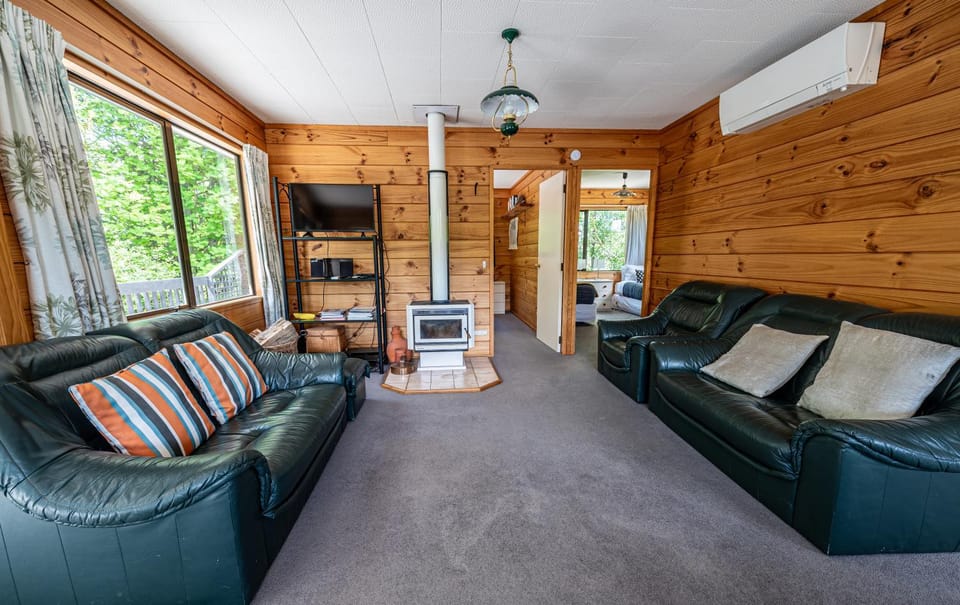 TV and multimedia, Living room, Seating area, fireplace, air conditioner