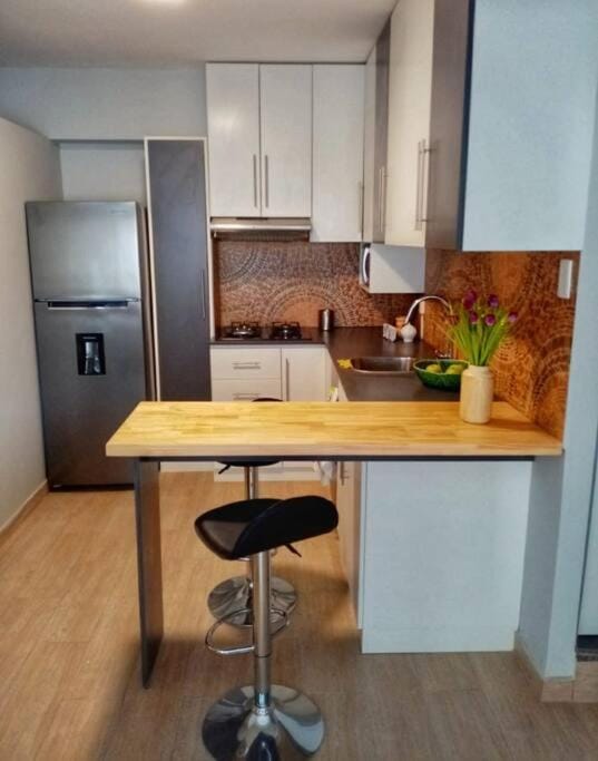 Kitchen or kitchenette, stove