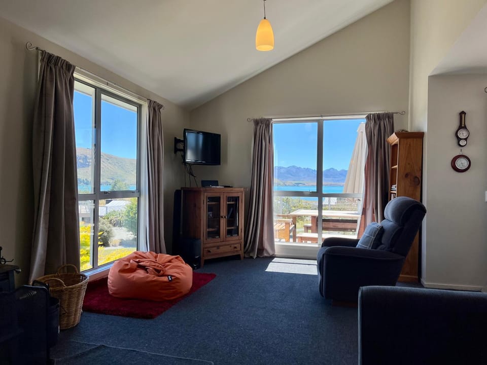 TV and multimedia, Living room, Seating area, Lake view, Mountain view