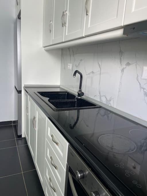 Kitchen or kitchenette, stove