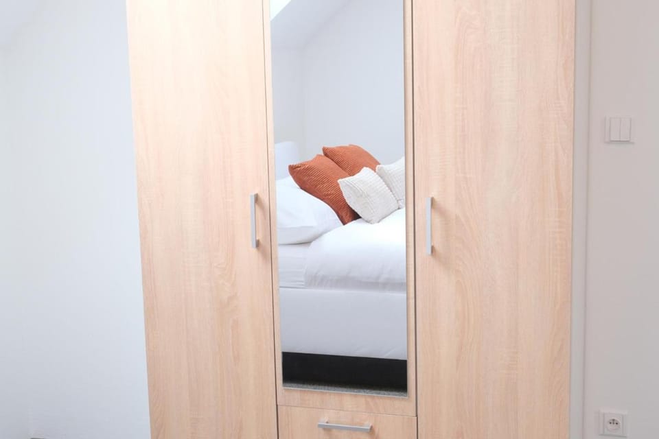 Bed, wardrobe