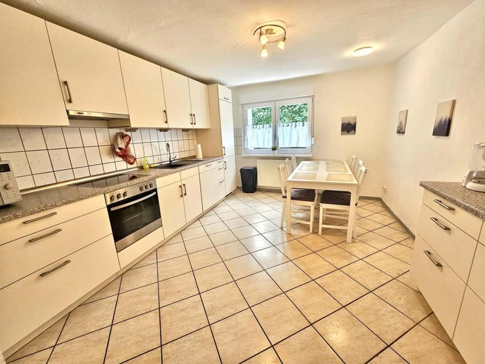 Kitchen or kitchenette, Seating area, Dining area, dishwasher, heating, microwave, oven, stove, toaster