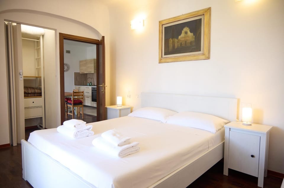Photo of the whole room, Bedroom, towels, air conditioner