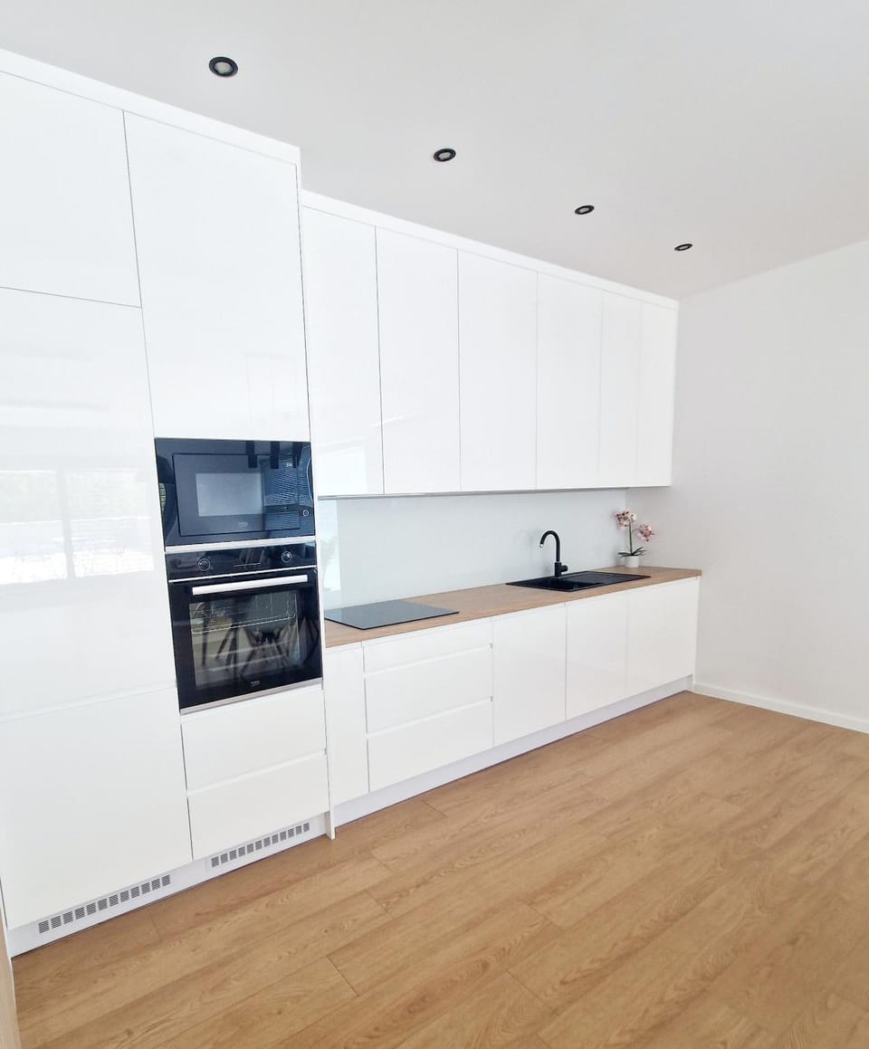Kitchen or kitchenette, dishwasher, microwave, oven, kitchen