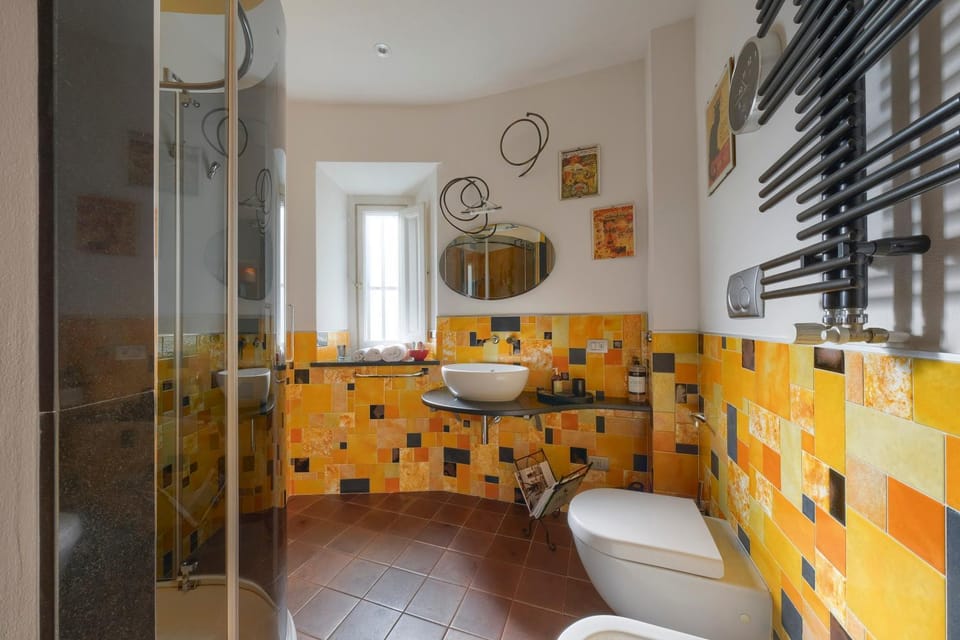 Toilet, Bathroom, bidet, hair dryier, towels