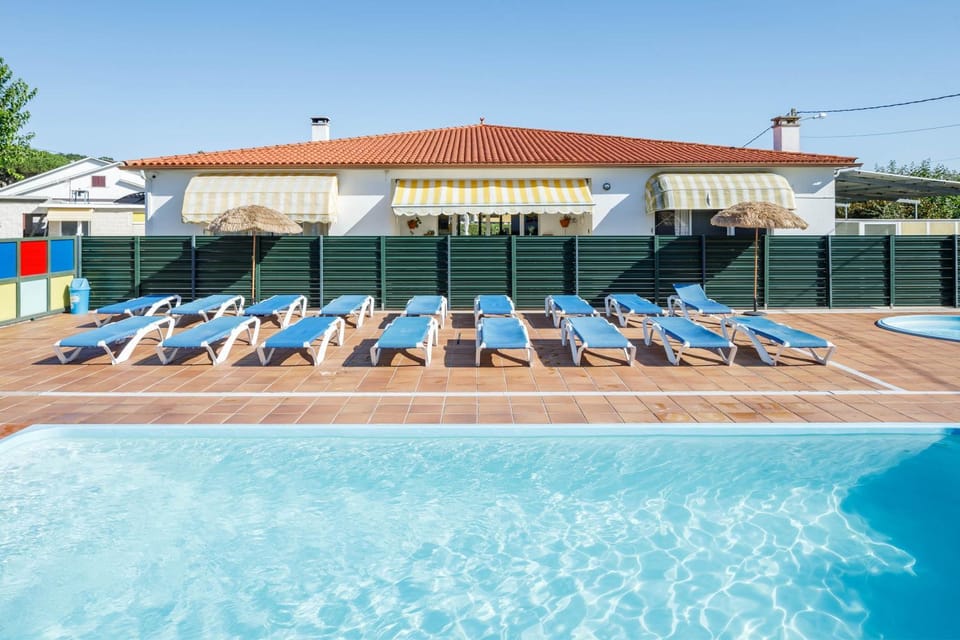 Property building, Living room, Swimming pool