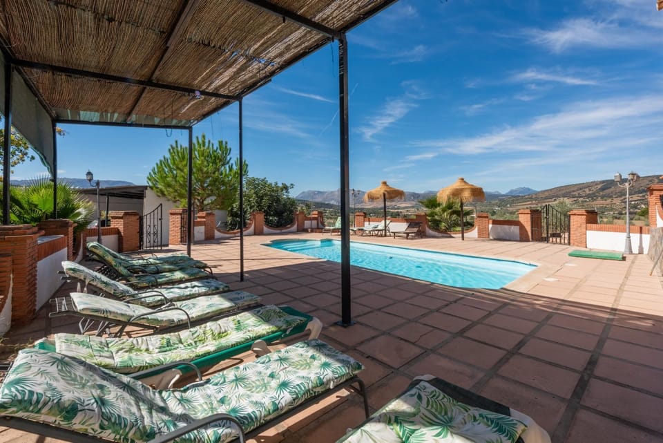 Property building, Living room, Swimming pool