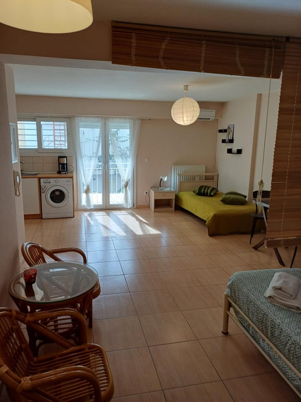 Kitchen or kitchenette, Seating area, Bedroom, washing machine
