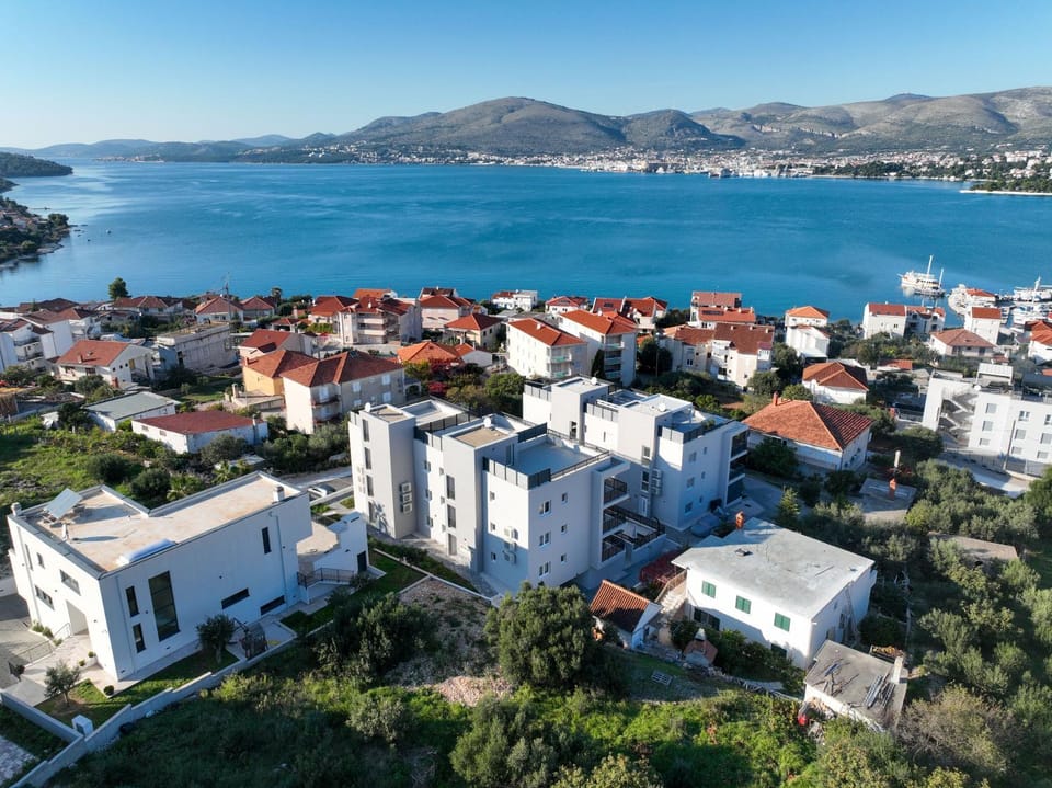 Property building, Nearby landmark, Day, Natural landscape, Bird's eye view, Sea view