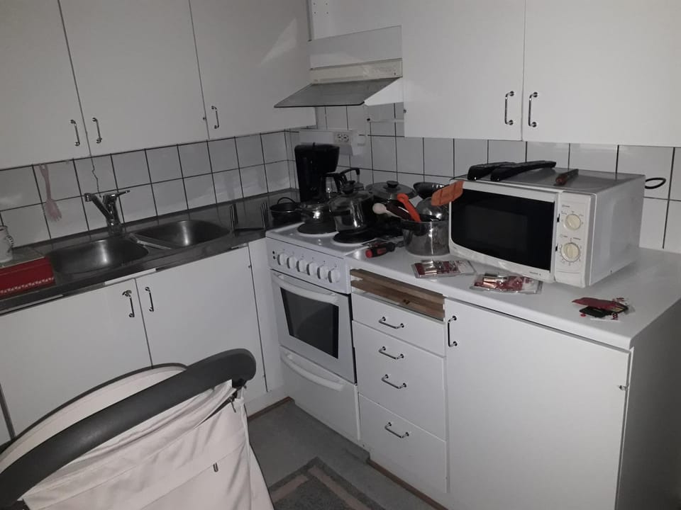 Kitchen or kitchenette, oven, stove, toaster