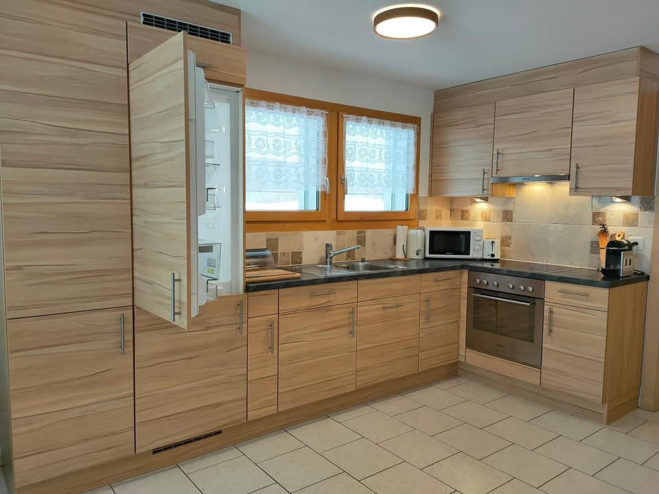 Kitchen or kitchenette, oven, stove, toaster