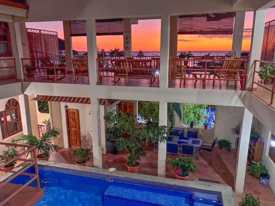 Property building, Natural landscape, Balcony/Terrace, Pool view, Swimming pool