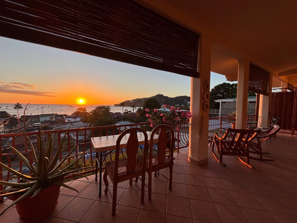 Natural landscape, View (from property/room), Balcony/Terrace, Seating area, Sea view, Sunset