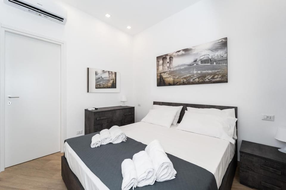Bed, Photo of the whole room, Bedroom, towels, air conditioner