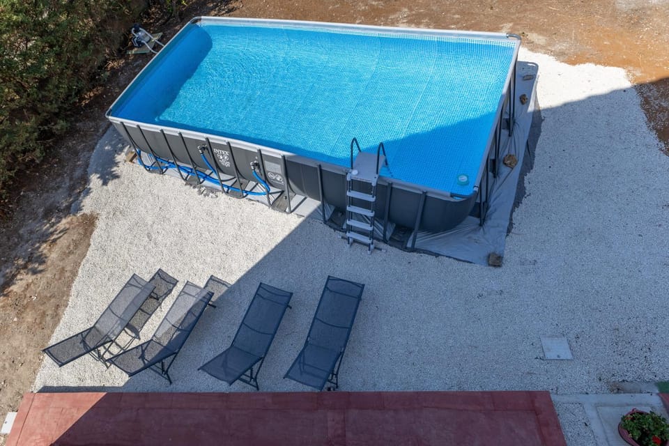 Property building, Living room, Swimming pool