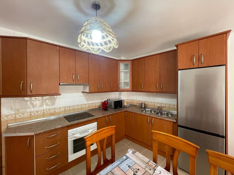Kitchen or kitchenette, Dining area, microwave, oven, stove, toaster