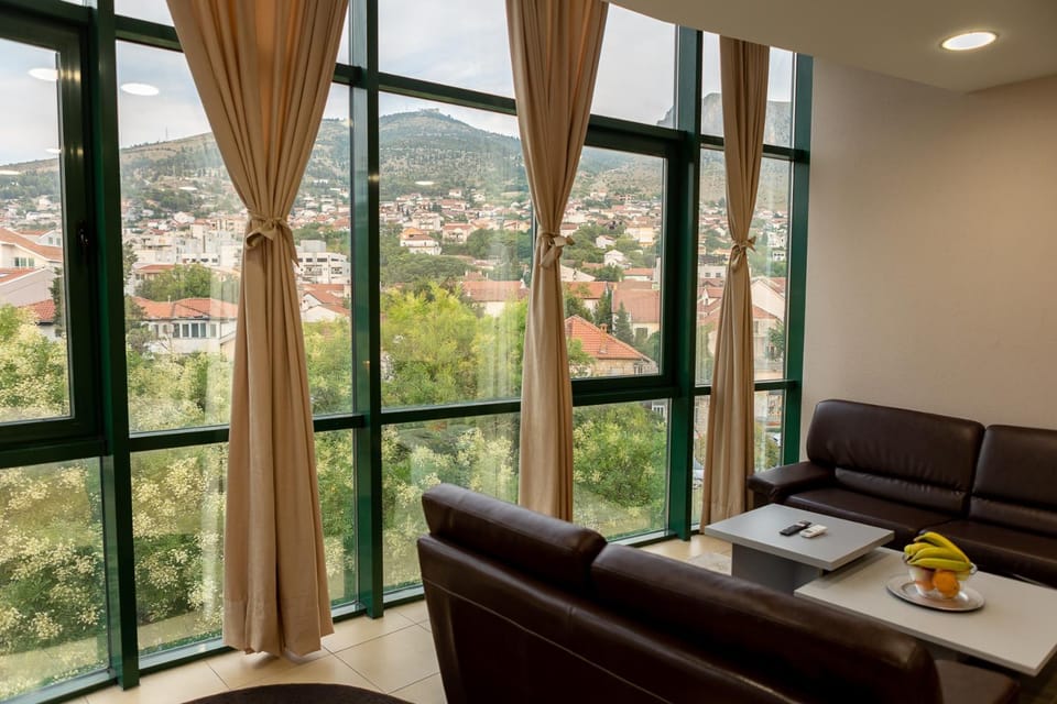 View (from property/room), Seating area, City view, Mountain view
