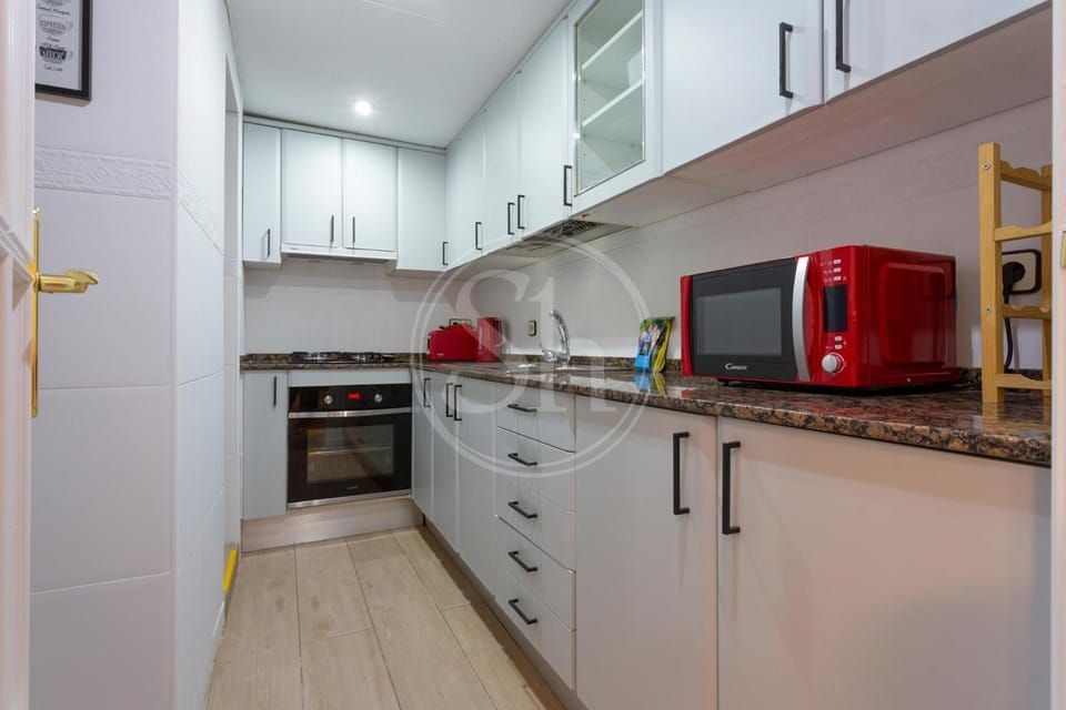Kitchen or kitchenette, oven, stove