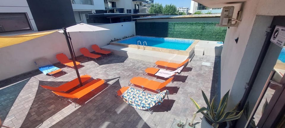 Seating area, Pool view, Swimming pool, sunbed