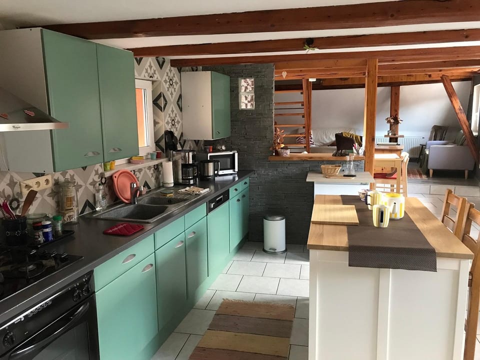 Kitchen or kitchenette, dishwasher, oven, stove, toaster