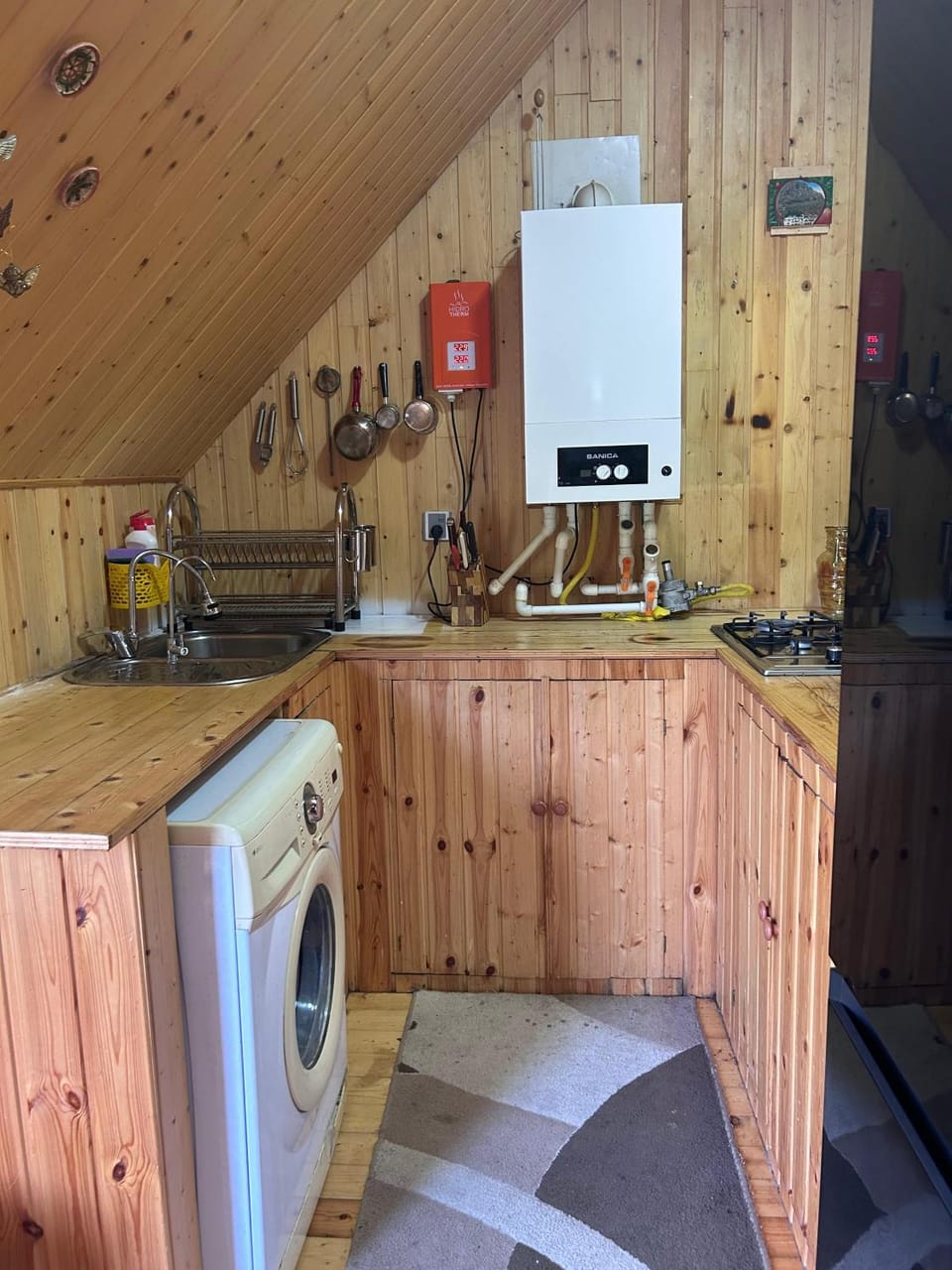Kitchen or kitchenette, washing machine