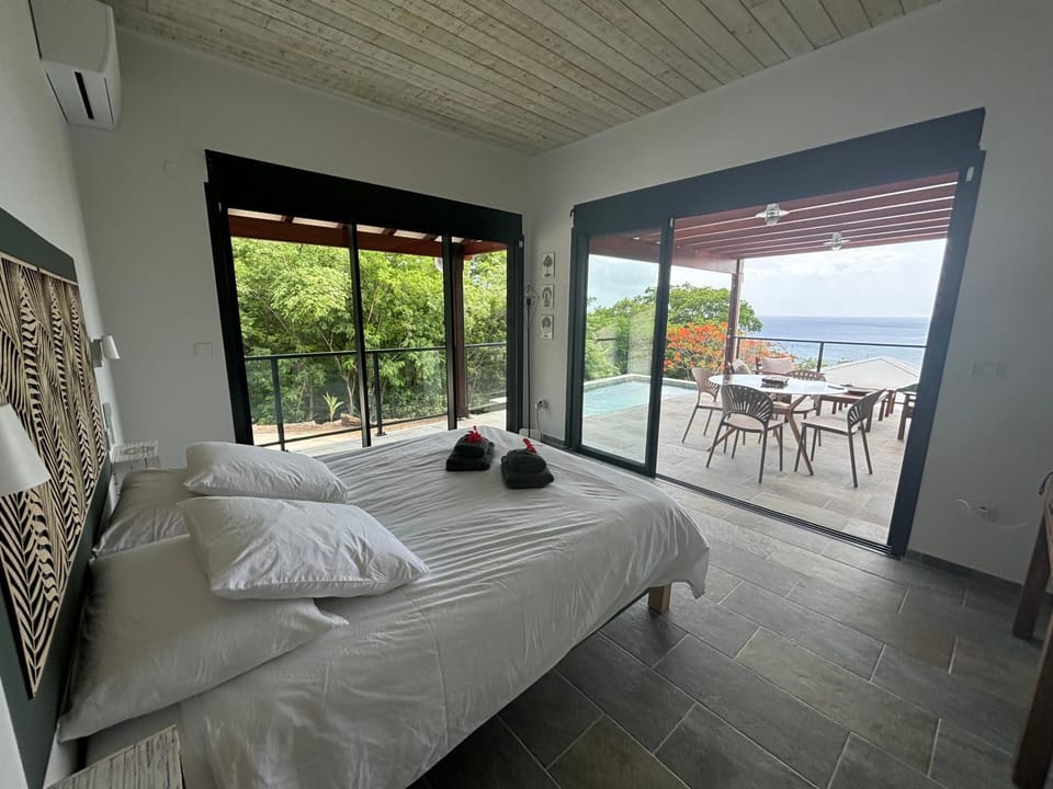 Patio, Bed, Natural landscape, View (from property/room), Photo of the whole room, Dining area, Bedroom, Sea view, towels