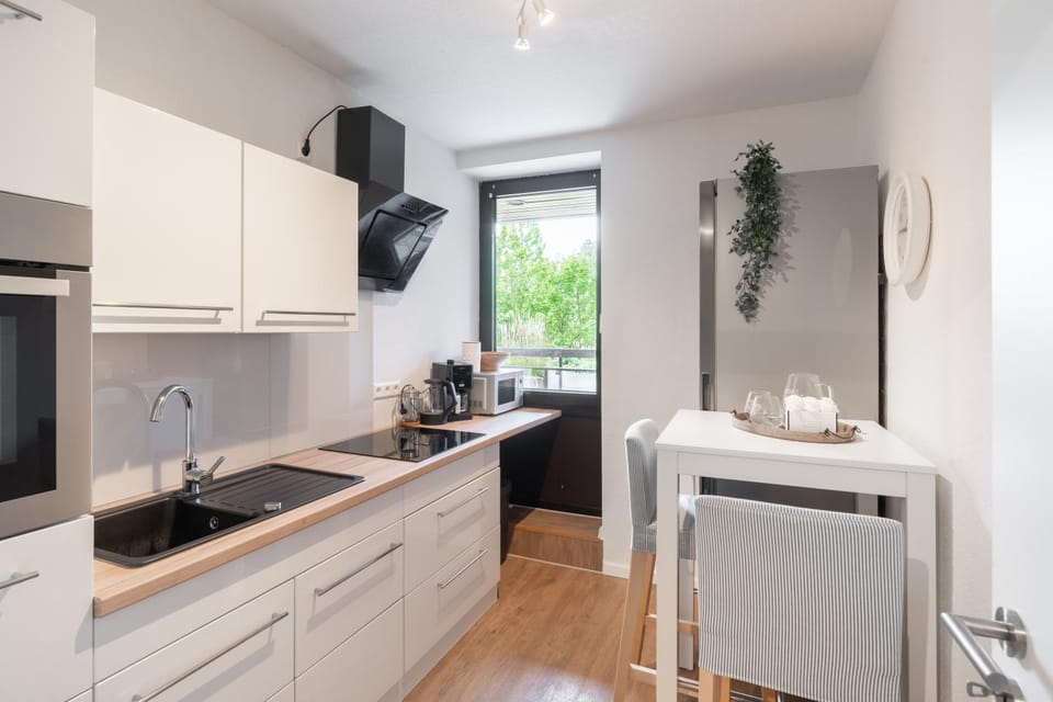 Kitchen or kitchenette, dishwasher, oven, stove, toaster