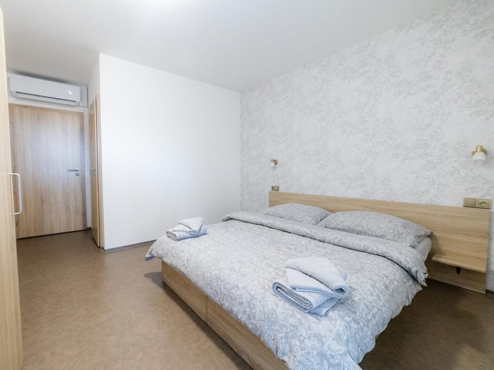 Bed, Photo of the whole room, Bedroom, towels, wardrobe