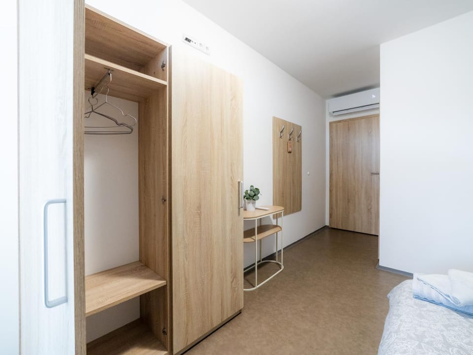 Bed, Bedroom, towels, wardrobe, air conditioner