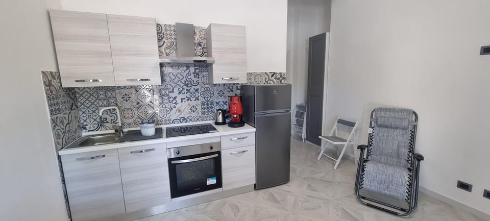 Kitchen or kitchenette, oven, stove
