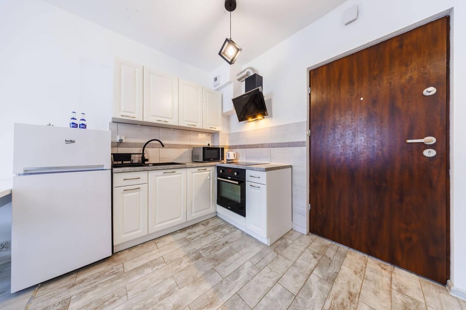 Facade/entrance, Kitchen or kitchenette, minibar, oven, stove, kitchen