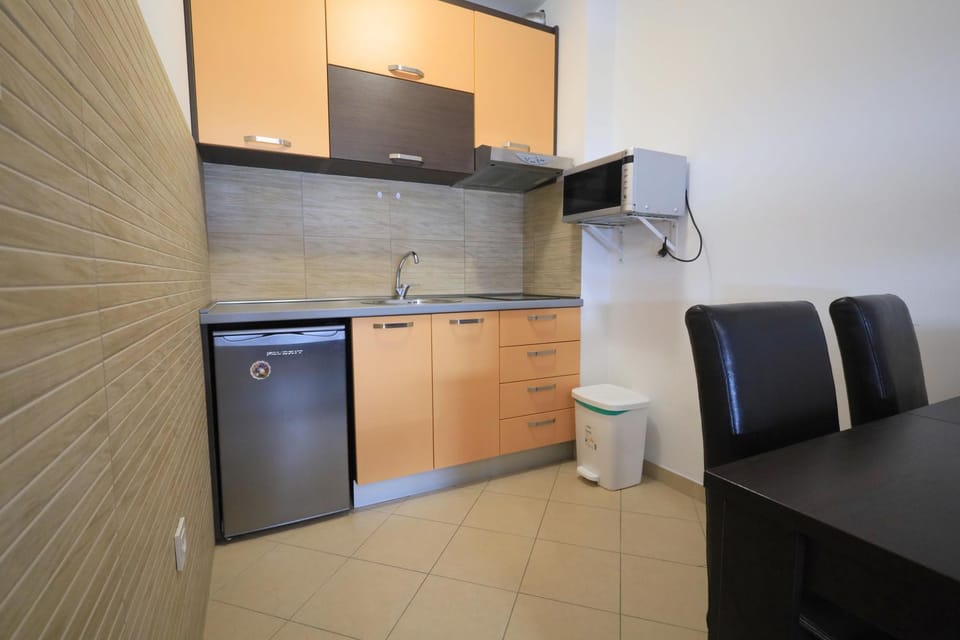 Kitchen or kitchenette, stove