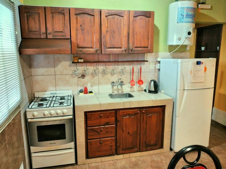 Kitchen or kitchenette, oven, stove