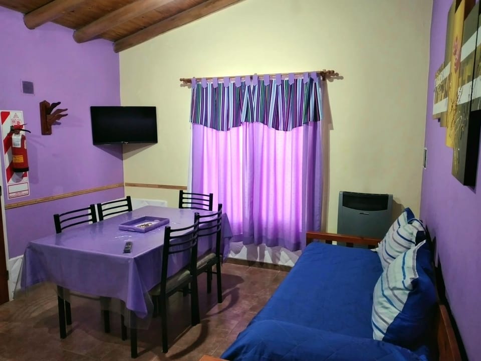Bed, TV and multimedia, Living room, Seating area, Evening entertainment