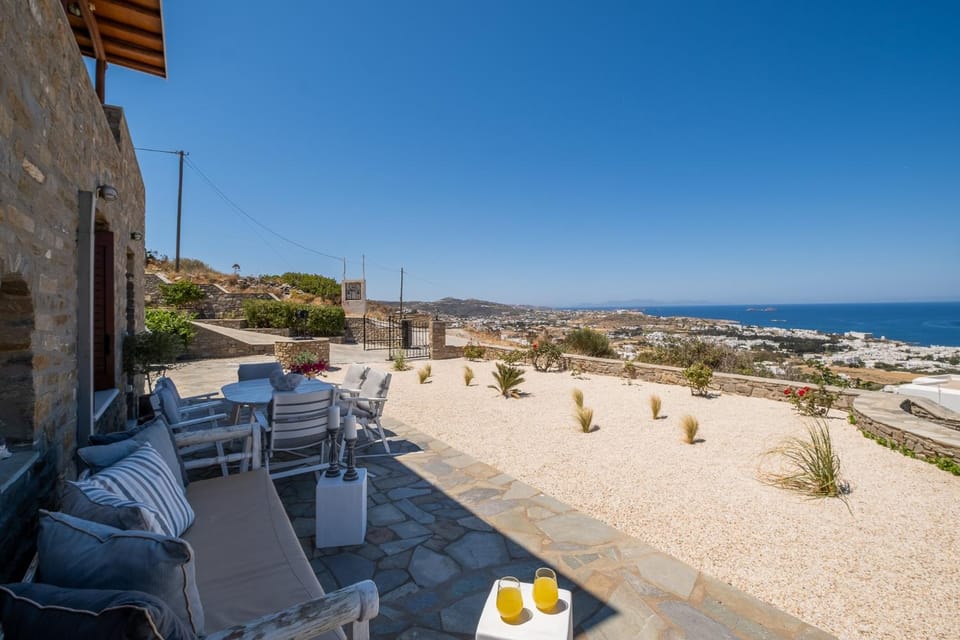 Patio, Natural landscape, View (from property/room), Balcony/Terrace, Living room, Seating area, Beach, Sea view