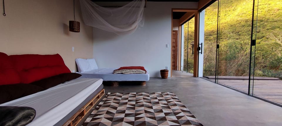 Bed, Living room, Seating area, Bedroom