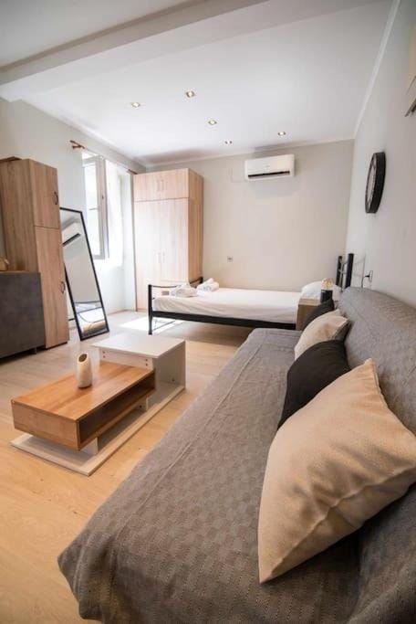 Bed, Living room, Seating area, Bedroom, air conditioner