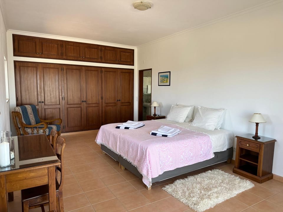 Bed, Living room, Photo of the whole room, Seating area, Bedroom, towels, wardrobe
