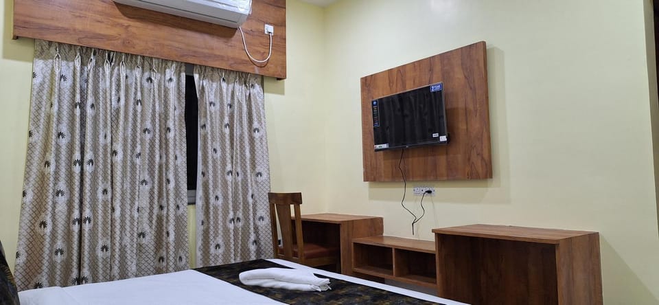 Bed, air conditioner