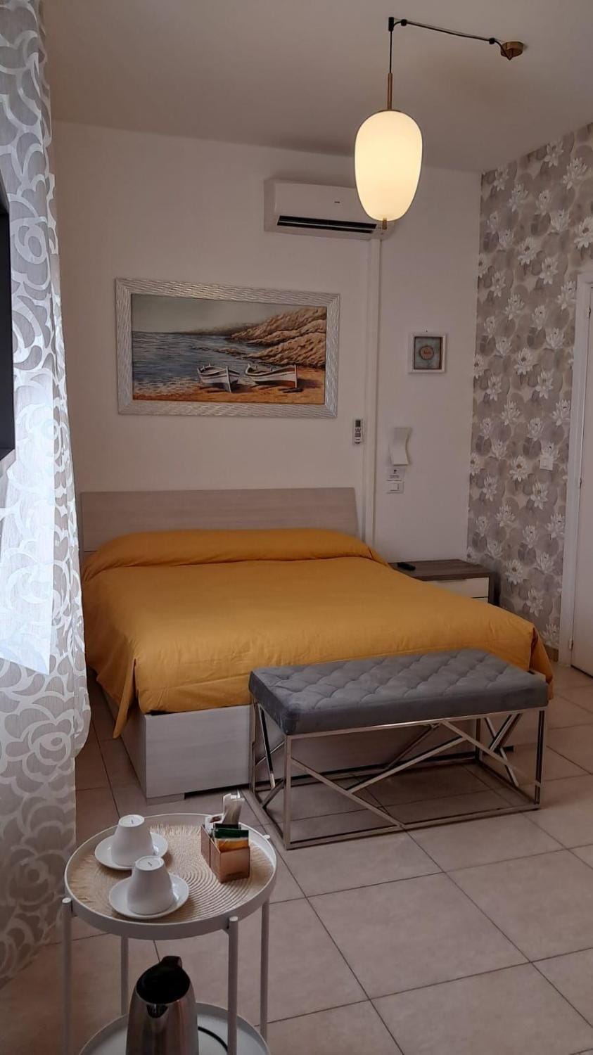 Bed, Seating area, Bedroom