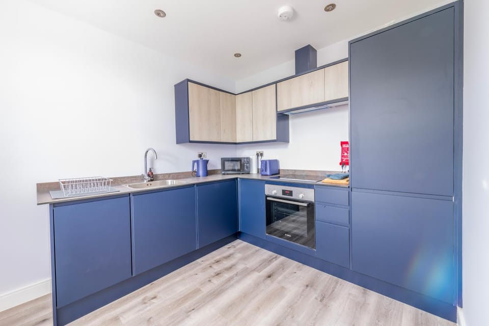 Kitchen or kitchenette, oven, stove, toaster