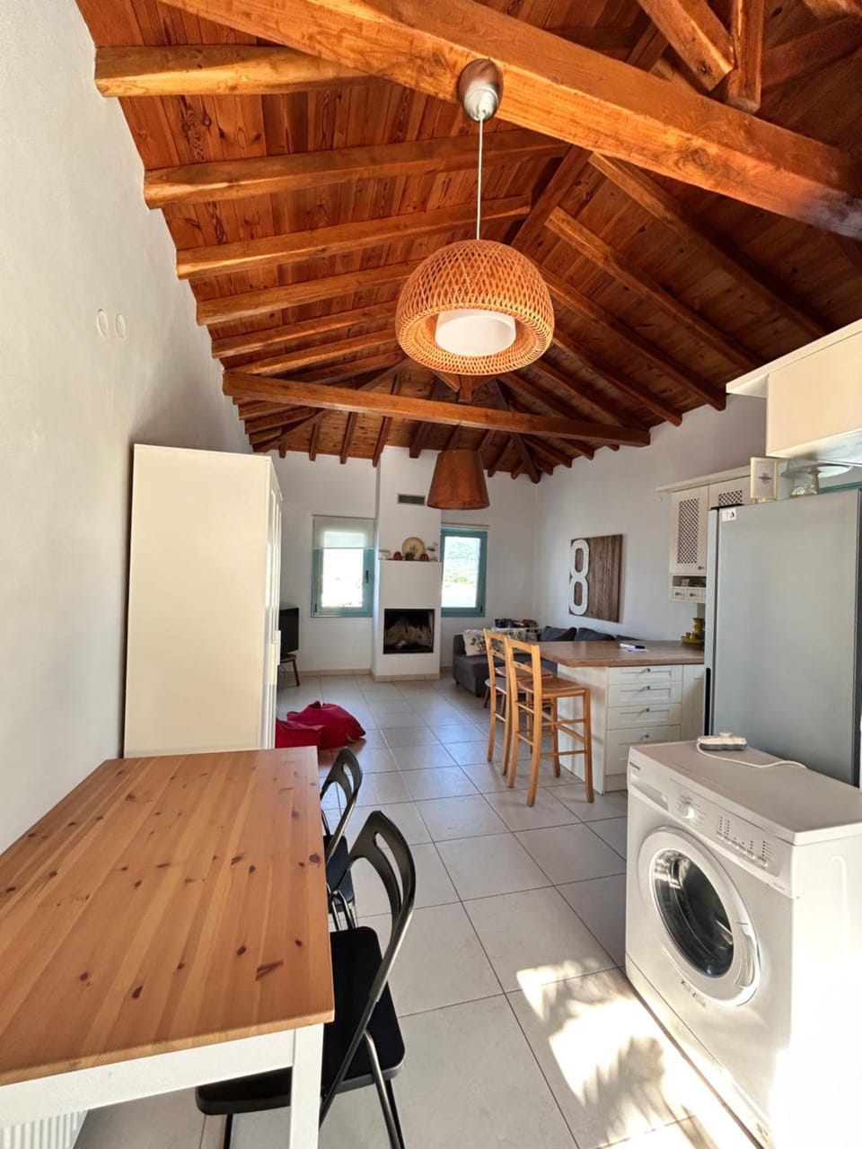 Kitchen or kitchenette, Living room, Seating area, Dining area, fireplace, oven, washing machine