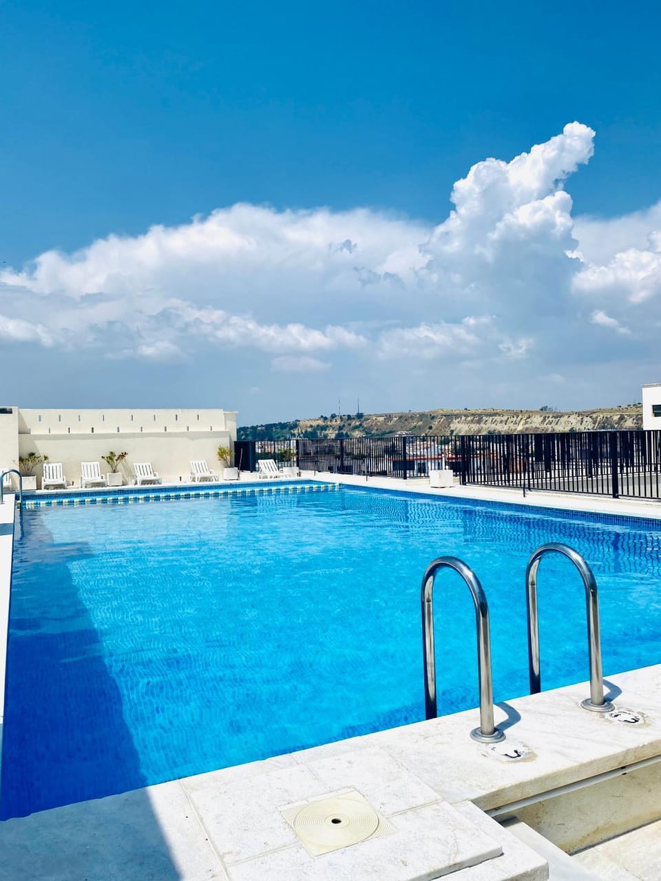 Swimming pool, sunbed