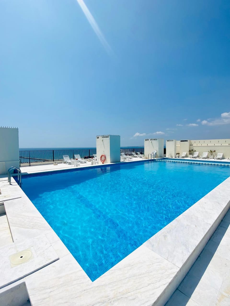 Swimming pool, sunbed