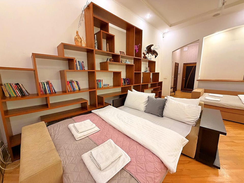Bed, Library, Living room, Photo of the whole room, Seating area, Bedroom, towels, wardrobe
