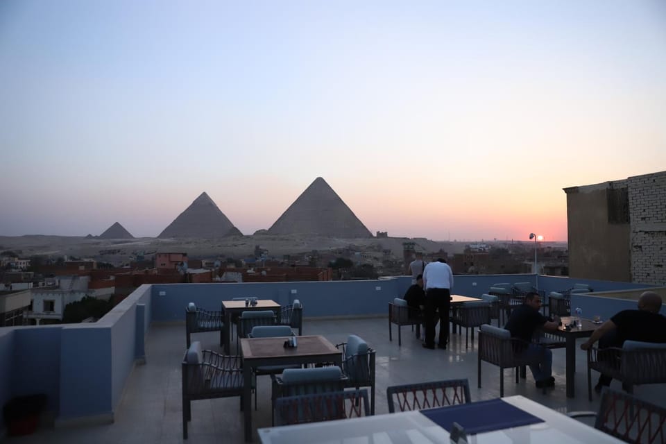Nearby landmark, Restaurant/places to eat, Day, People, Natural landscape, Banquet/Function facilities, Sunrise, Sunset, group of guests