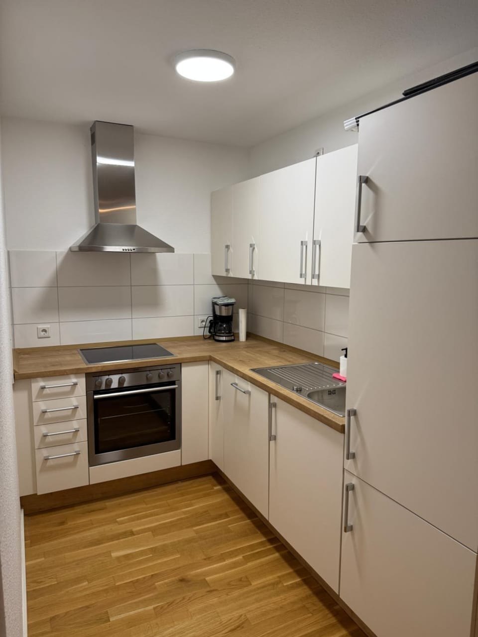 Kitchen or kitchenette, oven, stove, toaster