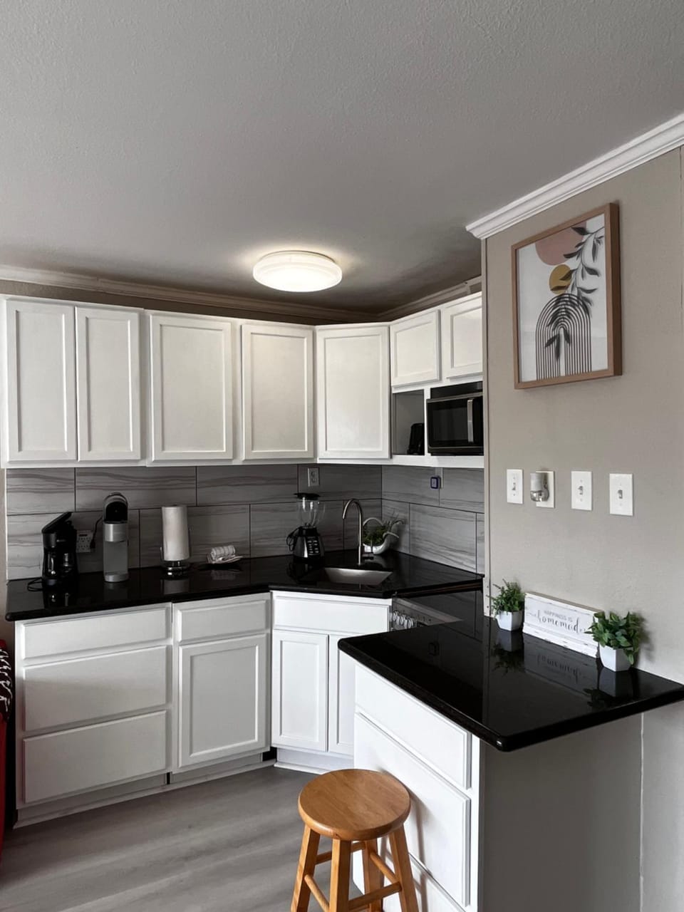 Kitchen or kitchenette, stove, toaster