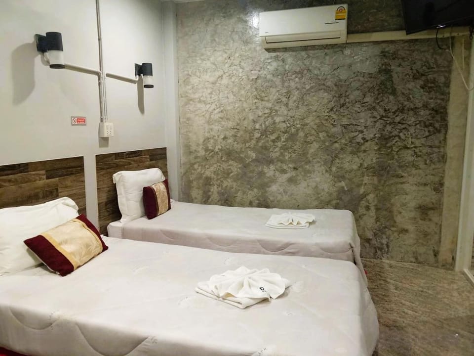 Bed, Photo of the whole room, Bedroom, towels, air conditioner
